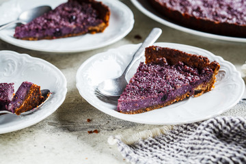 Pieces of vegetarian Berry Pie. Vegan baking concept.