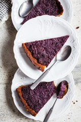 Pieces of vegetarian Berry Pie, top view. Vegan baking concept.