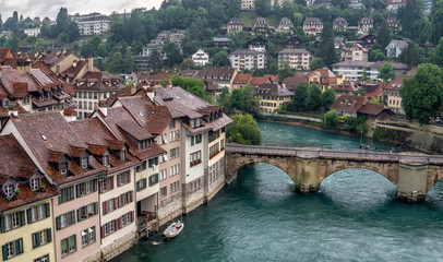 Fototapeta na wymiar Bern, Switzerland. Panorama of the old city and Untertorbrucke over Aare river