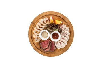 Different appetizer smoked meat and chicken on wooden plate isolated on white background
