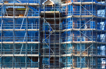 Construction site building with scaffolding 