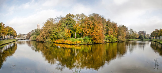 Zwolle, the Netherlands, November 11, 2019: panoramic composite image of the southern edge of the town's ramparts park and surrounding moat