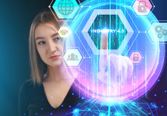 Business, Technology, Internet and network concept. Young businessman working on a virtual screen of the future and sees the inscription: Industry 4.0