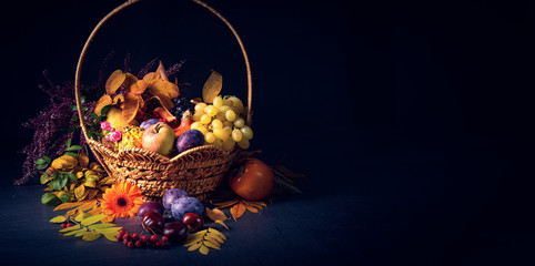 autumnal cornucopia in round basket