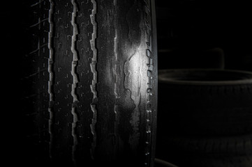 Damage tire on black background with copy space for text or image