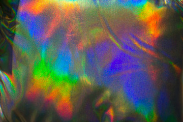 close up   holographic jacket , trendy abstract bright background
