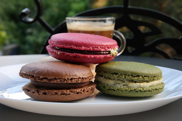 coffee and colored macaroons .