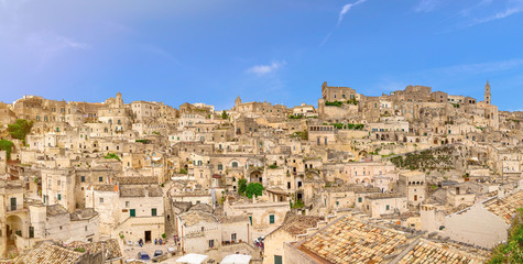 Fototapeta na wymiar Aerial panoramic view of historical centre Sasso Caveoso of old ancient town Sassi di Matera with rock cave houses, European Capital of Culture, UNESCO World Heritage Site, Basilicata, Southern Italy