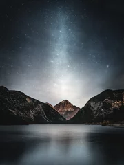 Fototapeten Night sky with stars by mountainlake Plansee Austria © lukas.saalfrank