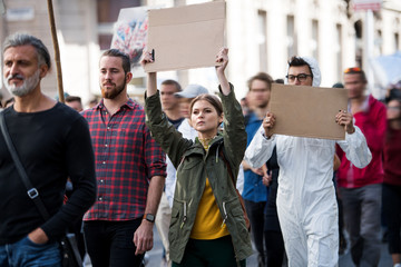 People with placards and posters on global strike for climate change.