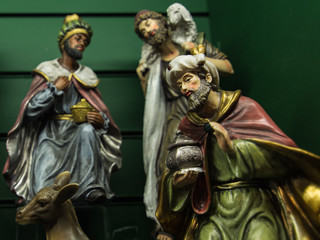 Obraz premium Christmas Manger scene with figurines, selective focus at Jesus.
