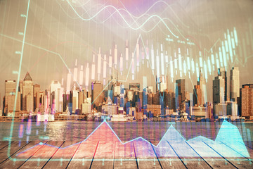 Forex graph on city view with skyscrapers background multi exposure. Financial analysis concept.