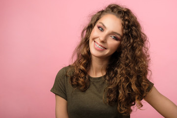 Pretty girl isolated on pink background