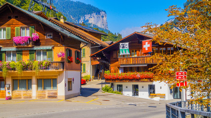 Fototapeta premium Few random wooden houses in the lauterbrunnen region of switzerland 