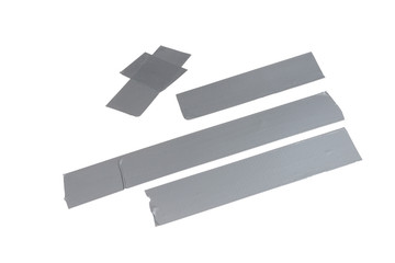 Silver scotch tape pieces isolated on white background.
