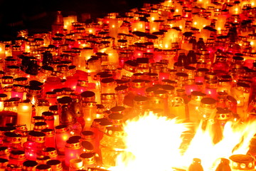 Candles in red and white color in the night. November 11th, Latvia celebrate Lacplesa day