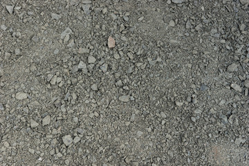 Dark gray gravel stones for the underground in road construction