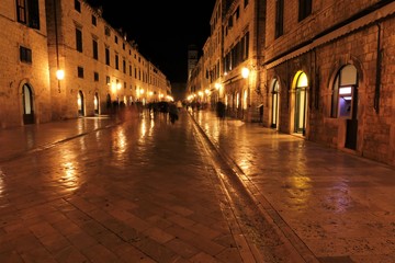 Fototapeta na wymiar Stradun in Dubrovnik at night with atmospheric lighting