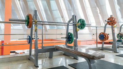 sports equipment and barbells in the gym