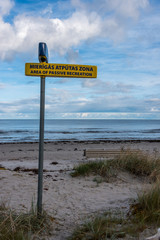 Funny Recreation Signs on a Baltic Sea Beach in November on a Cloudy Day