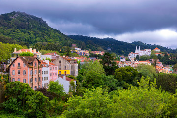 Portuguese city of Sintra, a UNESCO World Heritage Site. Sintra city near Lisbon with Sintra National Palace in the background. Sintra, Portugal.