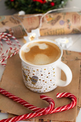 cup of coffee and christmas candy close-up