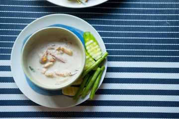 Stew crab with coconut milk dip with fresh vegatables