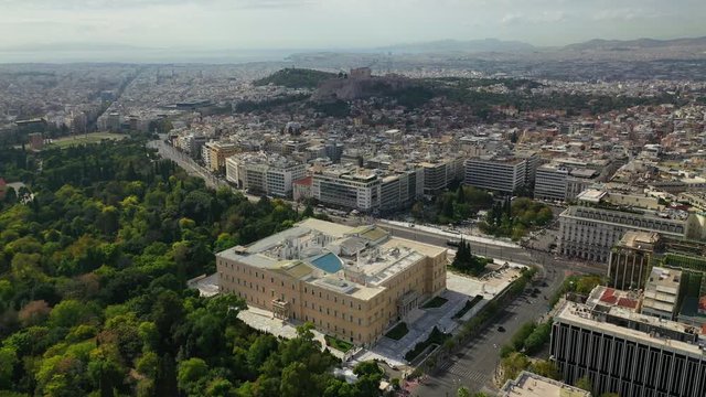 Aerial drone video of Greek Parliament building in syntagma square in the heart of Athens, Attica, Greece