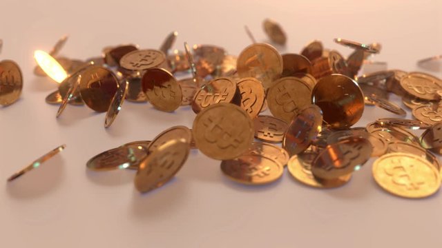 Animation, showing thin Bitcoins bouncing on a white surface. 