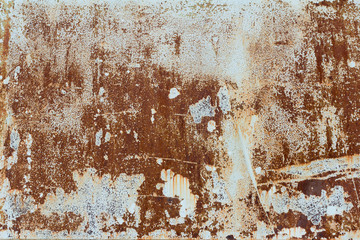 Light blue corroded metal background. Rusty and scratched painted metal wall. Rusty metal background with paint residue
