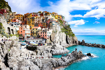 Exploring the coastal village of Manarola,  which is a small village in the Liguria region of Italy known as Cinque Terra