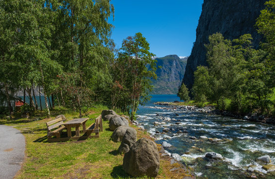 View on Mountainriver in Undredal with cloudy sky, nearby Naerofjord, Gudvangen, Flam. Norway.