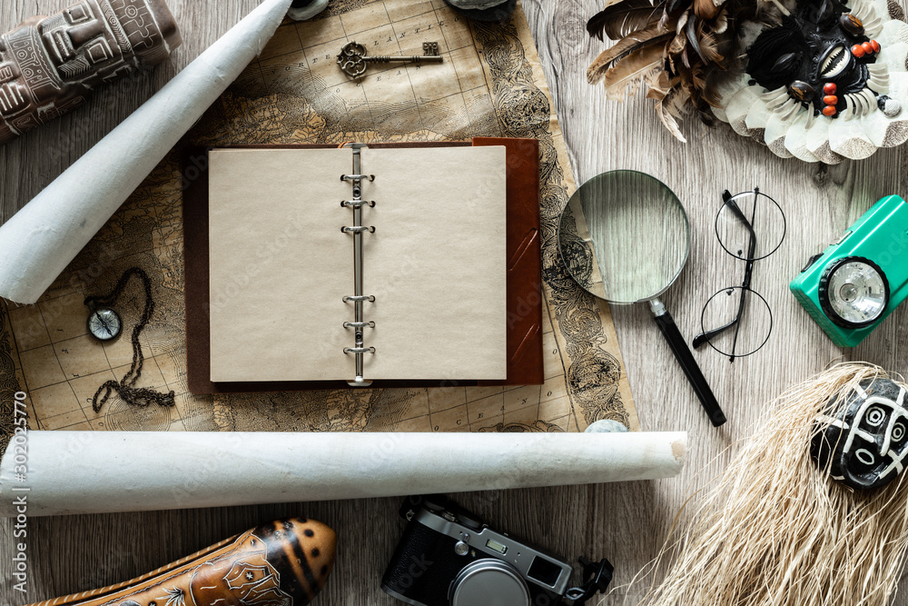 Aufkleber Journey.  Notebook with space for text.  Souvenirs and things related to travel and exploring the world.