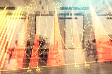 Stock market chart with trading desk bank office interior on background. Double exposure. Concept of financial analysis