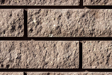 background section of brick wall dark red close up