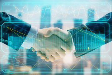 Plakat Double exposure of financial graph on cityscape background with two businessman handshake. Concept of stock market deal