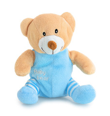Cute bear doll isolated on white background with shadow reflection. Playful bright brown and blue bear sitting on white underlay. Teddy bear plush stuffed puppet toy.