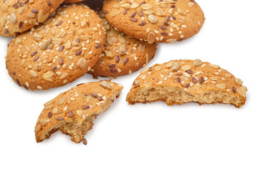 Cookies with nuts and seeds isolated on white background