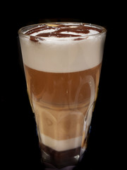 Five layered cappuccino coffee with chocolate laced topping