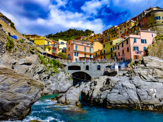  exploring the costal village of Monarola, which is a small village in the Liguria region of Italy known as Cinque Terra