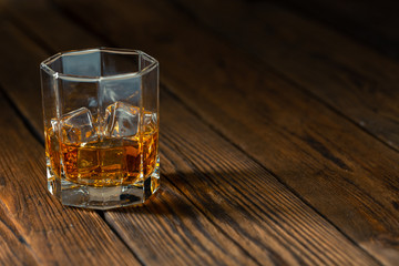 Whiskey in glass with ice