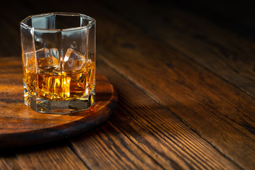 Whiskey in glass with ice
