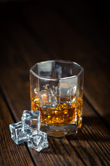 Whiskey in glass with ice