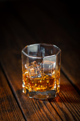 Whiskey in glass with ice