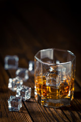 Whiskey in glass with ice