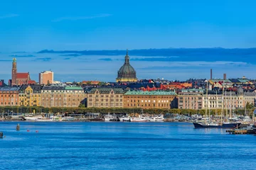 Foto op Canvas Panoramic view of the boulevard Strandvägen in Östermalm from Saltsjön bay with various touristic sightseeing boats, yachts, ferry  and ships in Stockholm, Sweden. © Igor Groshev