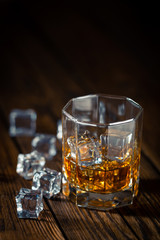 Whiskey in glass with ice