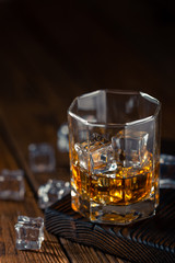 Whiskey in glass with ice