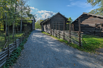 Example of well-preserved traditional pre industrial wooden farmstead at Skansen open-air museum. Stockholm, Sweden.