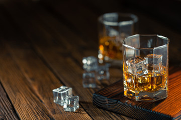 Whiskey in glass with ice